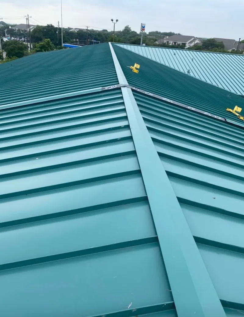 Green commercial metal roof ridge and valley for Metal Roof Repair in Olive Branch